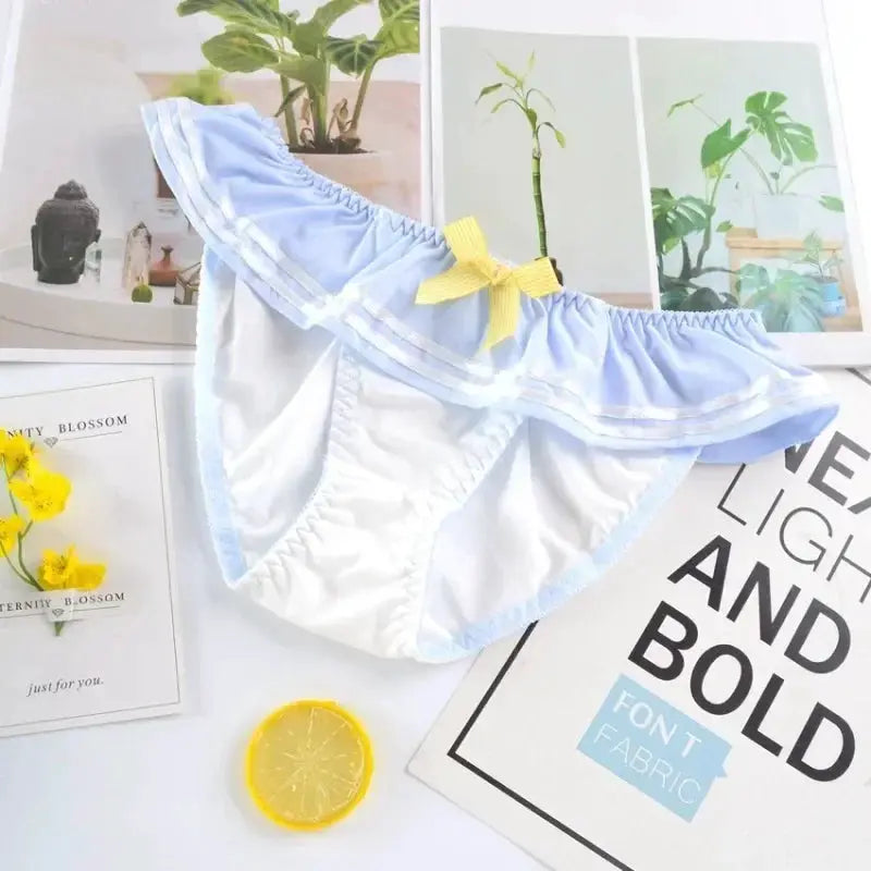 Panties by Simples Market in milk silk, light blue and white with a yellow bow
