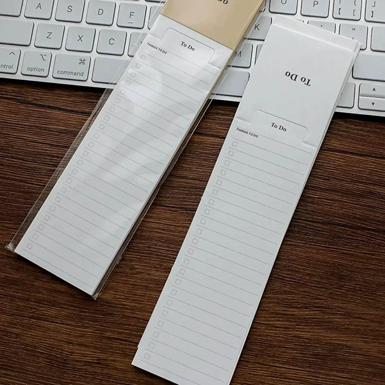 MINKYS 24-sheet bookmark-type memo pads, white two-pack with To Do lists on ruled lines beside a keyboard