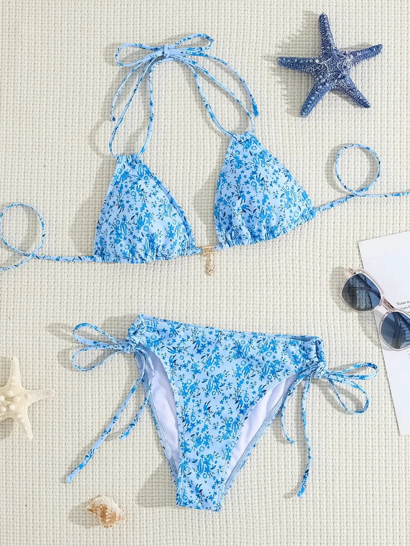 Bikini set: light-blue floral two-piece with adjustable tie-side top and bottoms