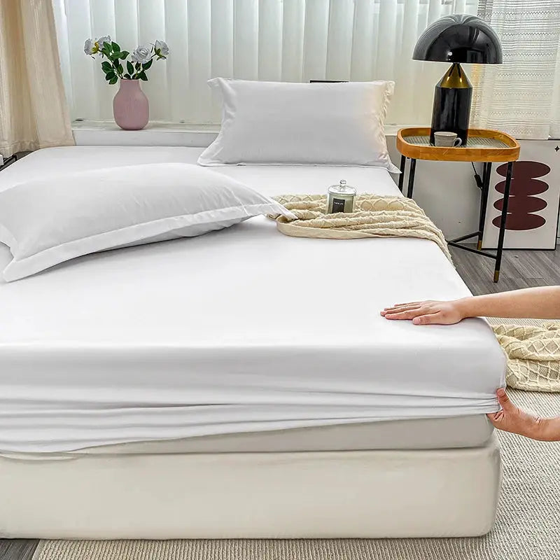 Fitted bed sheet with elastic band, solid white, anti-slip design for single to king beds; simple bedroom essential