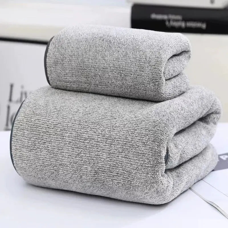 Gray bamboo towel set; quick-drying, soft and absorbent bath and hand towels; multi-piece collection.