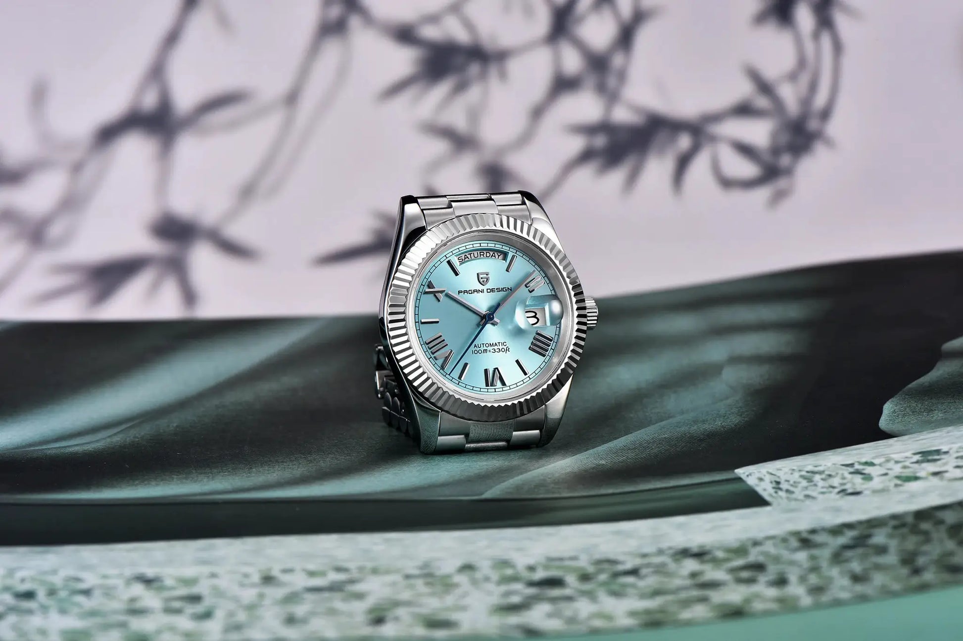 Pagani Design DD40 men's stainless steel watch with light blue dial and day-date window