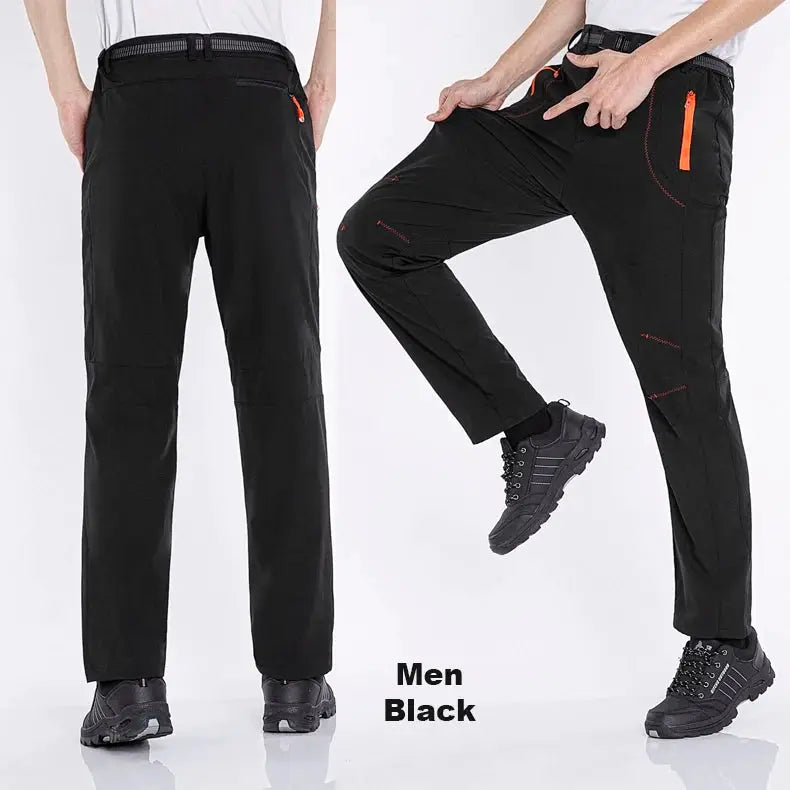 Men's black hiking pants with orange zippered pockets; shown in back and side views.