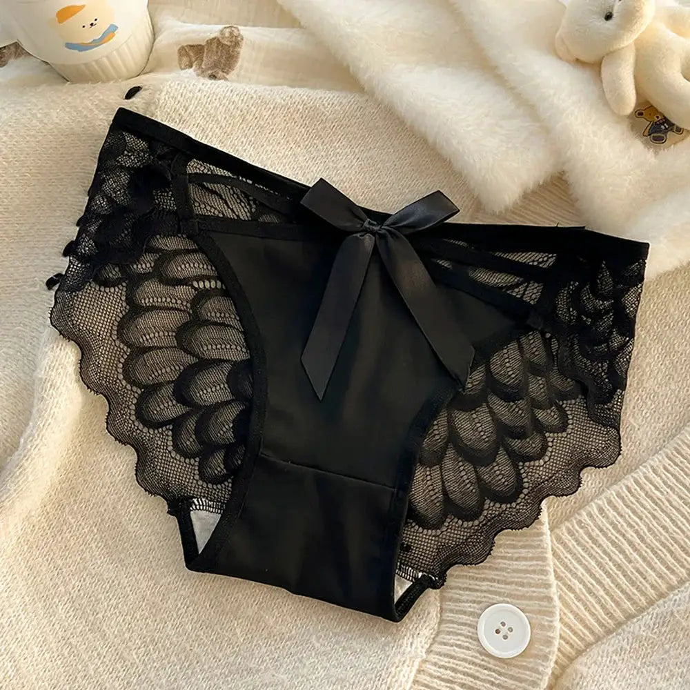 Women's black lace panties with satin front panel and bow, scalloped lace sides, mid-low rise