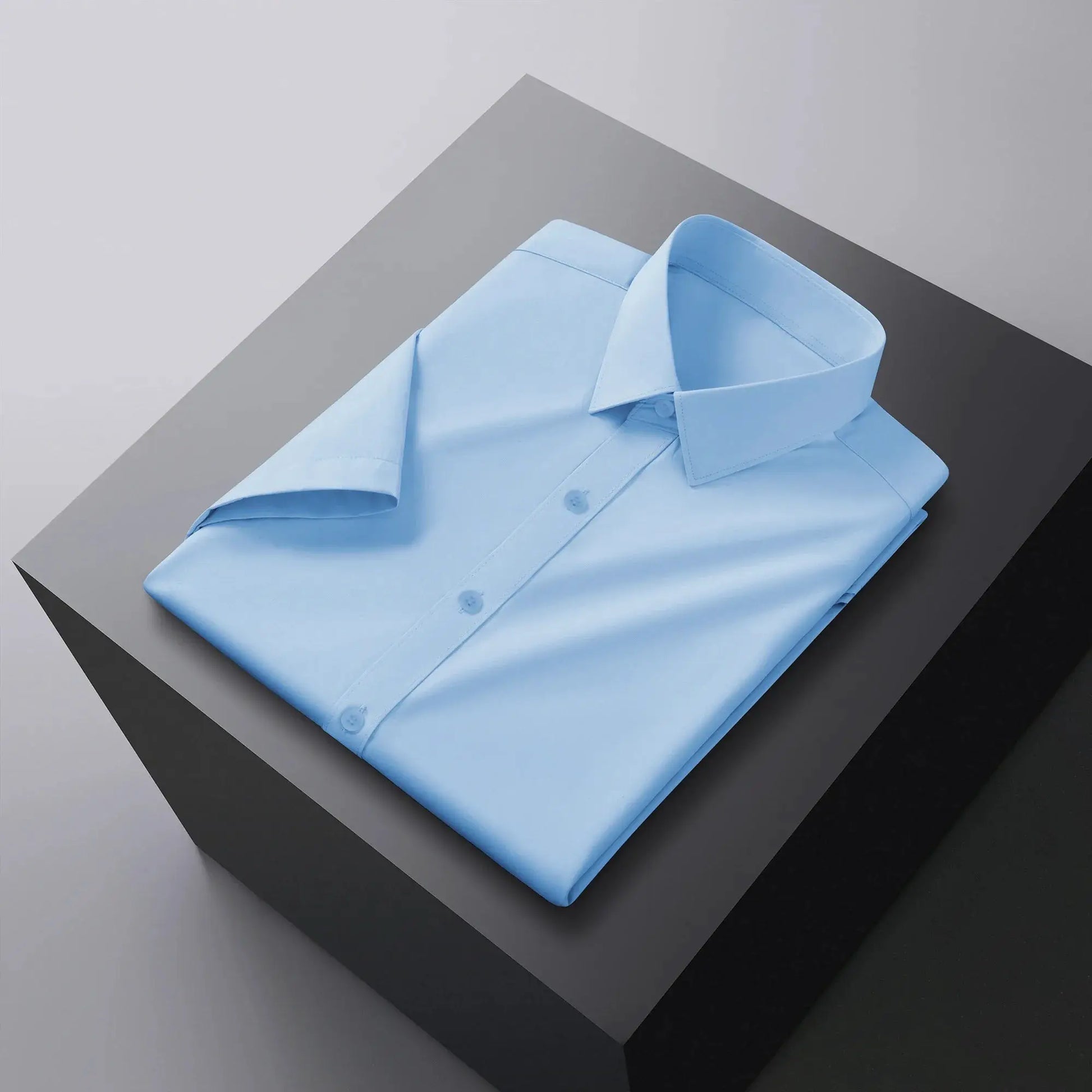 Light blue solid-color men's short-sleeve business casual shirt, neatly folded