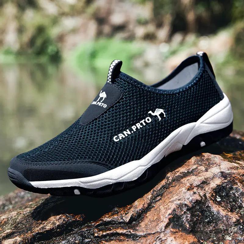 Men's breathable mesh slip-on sneakers by CAN.PRTO in black with white sole