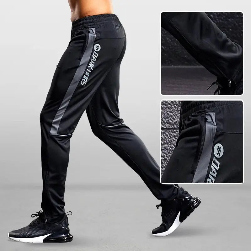 Simples Market men's sport pants with zip pockets, black fabric and grey side stripe, tapered fit