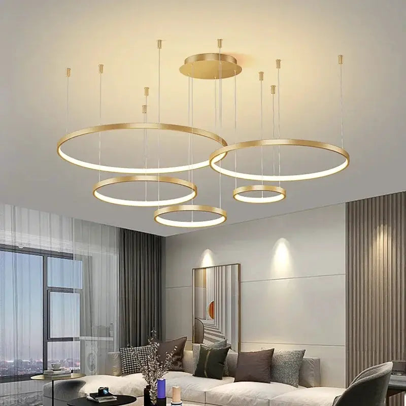 Simples Market minimalist five-ring pendant lights, gold acrylic LED chandelier for living room.