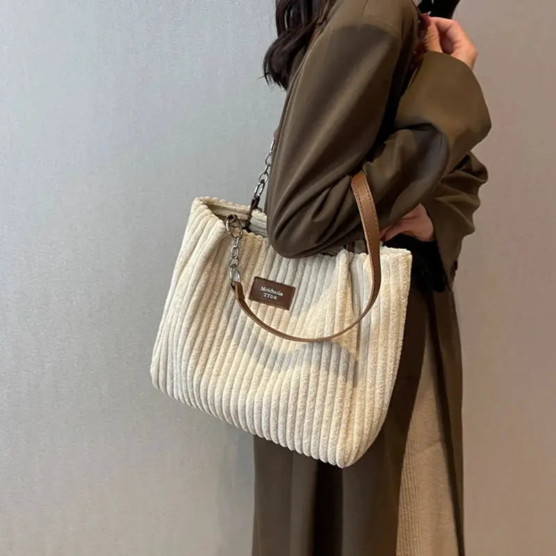 Women corduroy shoulder bag by Simples Market, beige solid-color handbag with brown leather strap and large capacity.