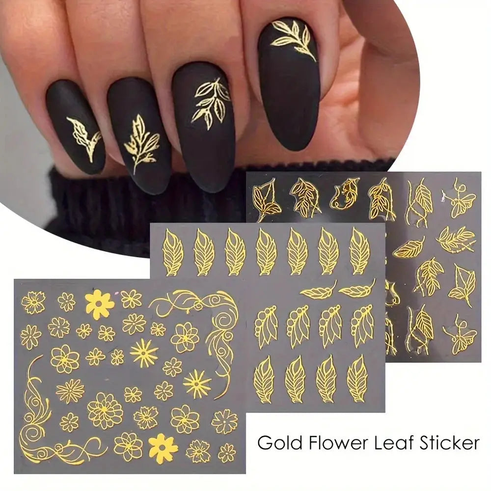 Nail art sticker sheets, 30 gold floral leaf designs for DIY manicure, self-adhesive on matte black nails.