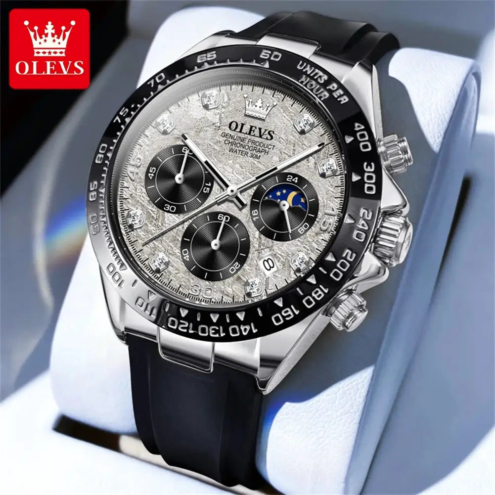 OLEVS men's luxury quartz chronograph watch with silicone strap, silver dial, black subdials and moon phase.