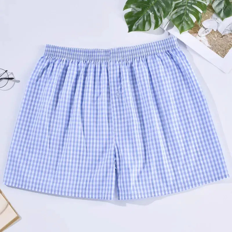 Men's blue gingham cotton boxer shorts for sleepwear, loose and comfortable home underwear.