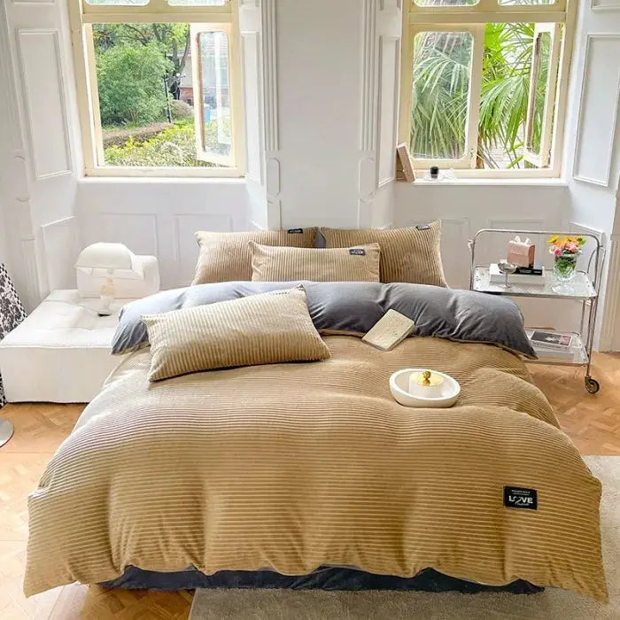 Simples Market 3-piece duvet cover bedding set in tan and gray with pillowcases on a bed