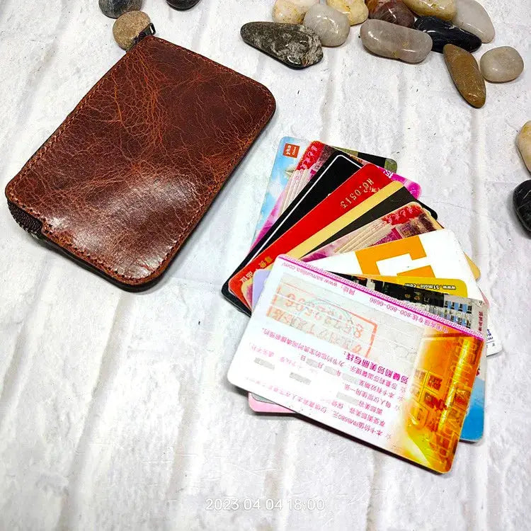 Mini zipper waist bag in brown leather with card slots and ID holder