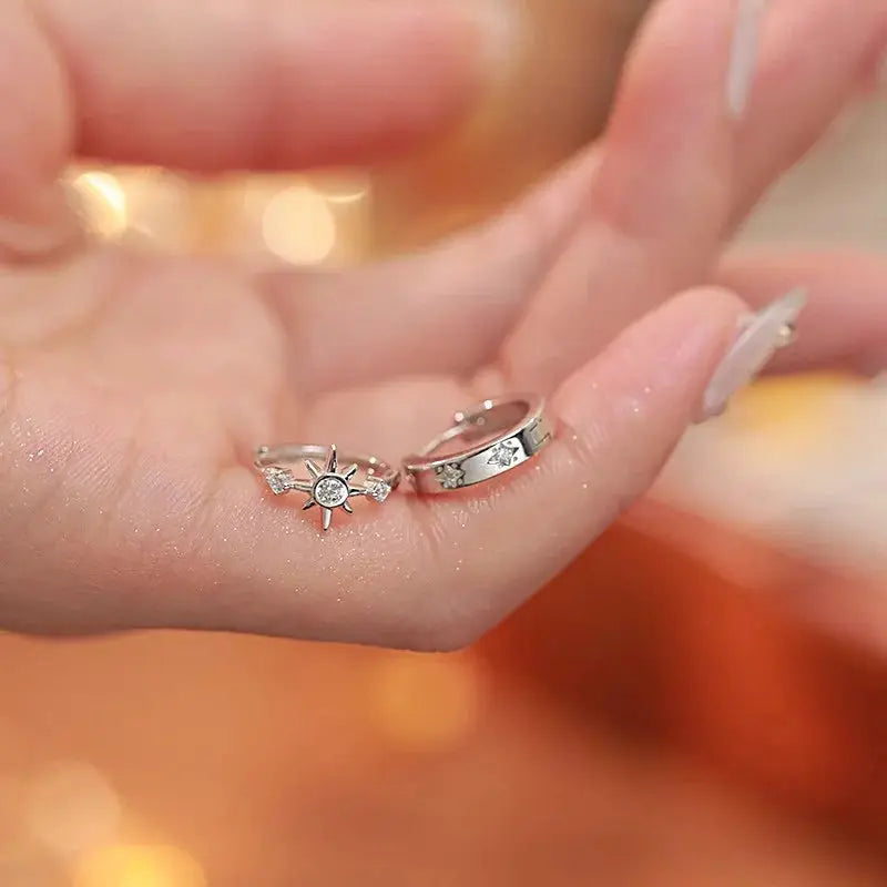 Sterling silver zircon star asymmetry hoop earrings by Simples Market; star stud and small hoop duo.