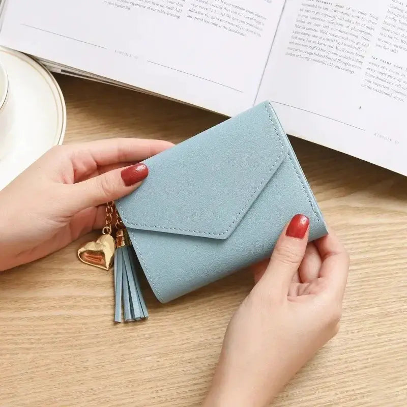 Light-blue PU leather short wallet with tassel and gold heart charm