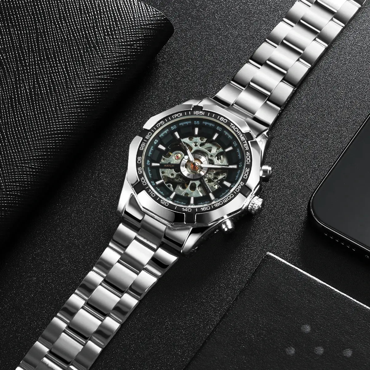 Winner Classic Skeleton Men's Watch with luminous hands, stainless steel bracelet, exposed gears, tachymeter bezel