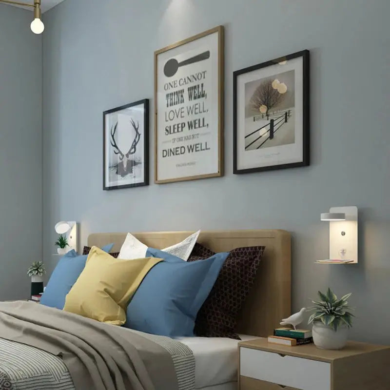 Bedroom LED wall lamp with USB charging by Simples Market; pair of white modern sconces on gray wall above the bed