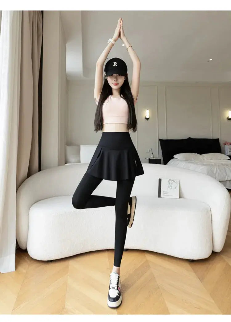 Women fake two-piece black leggings set with high-waist pocket, seamless yoga pants and skirt overlay