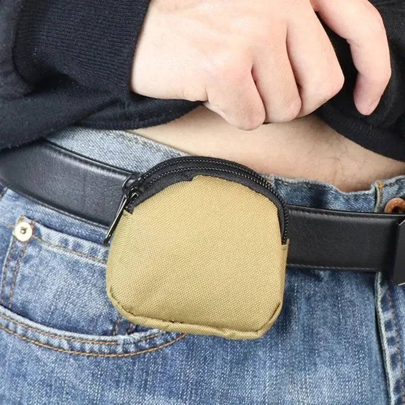 Nylon double-zipper coin purse MOLLE pouch in tan, lightweight outdoor card holder with belt clip on a black waist belt
