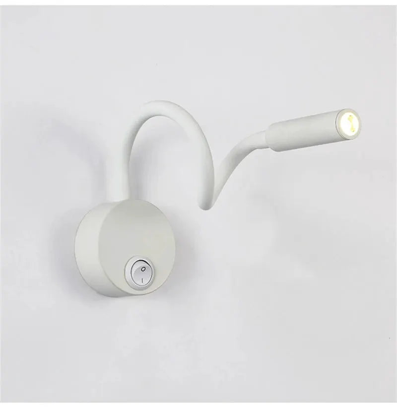LED Flexible Hose Wall Lamp by Simples Market, white finish with gooseneck and switch.