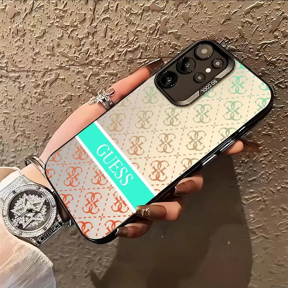 GUESS Samsung Galaxy phone case with colorful silver pattern and turquoise logo stripe