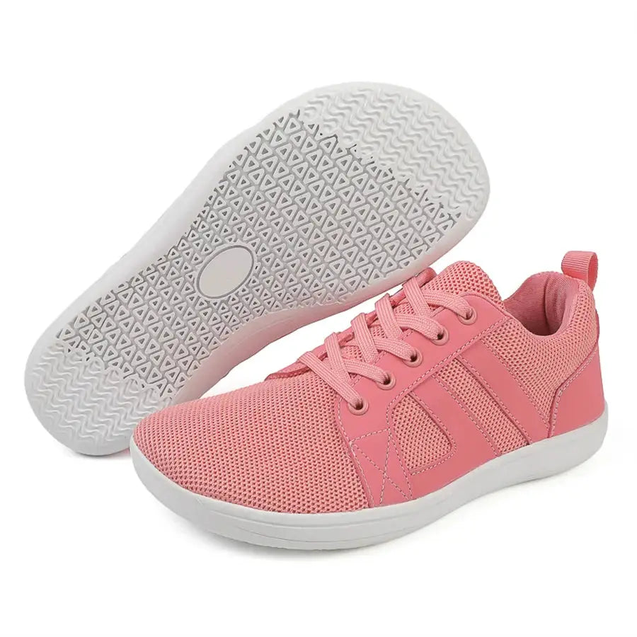 Wide-toed pink athletic shoes by Simples Market for walking and jogging; mesh upper, white sole.