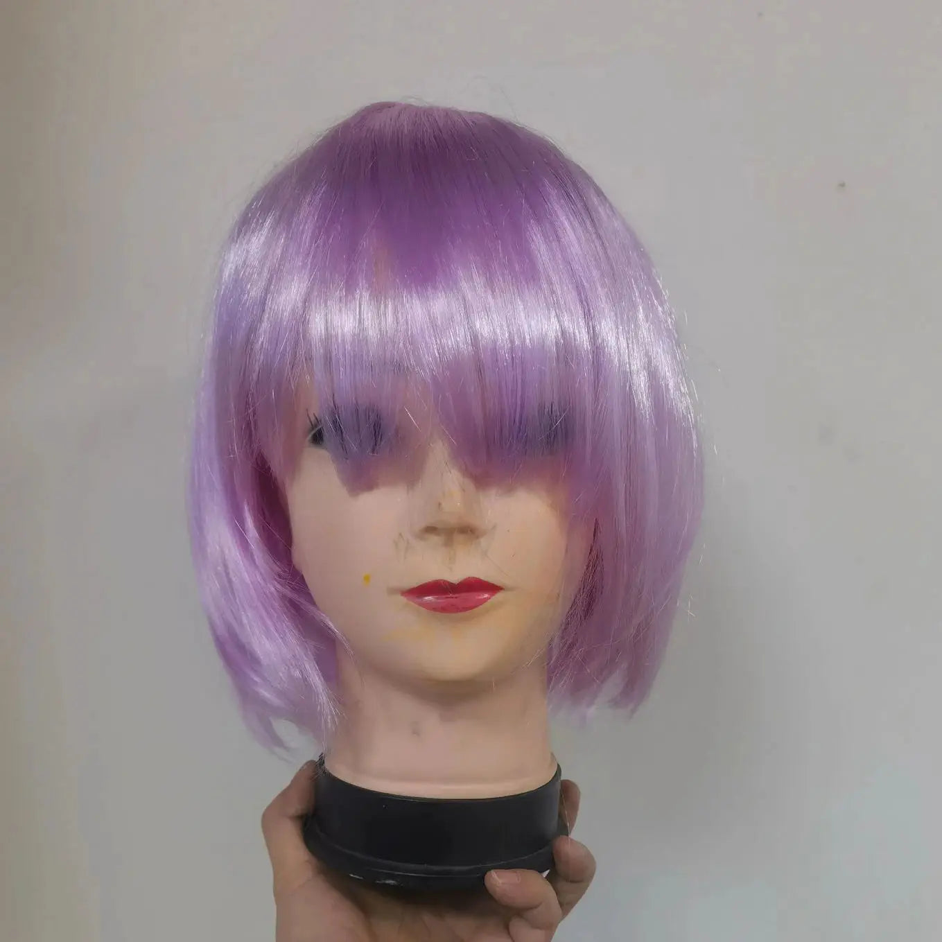 Bob wig; short lavender purple bob on mannequin head, synthetic cosplay wig