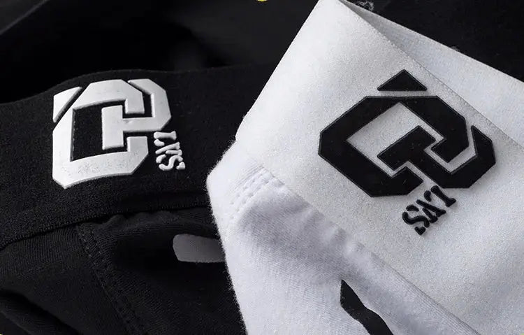 Men's cotton boxer shorts by Simples Market; black fabric with white logo waistband.
