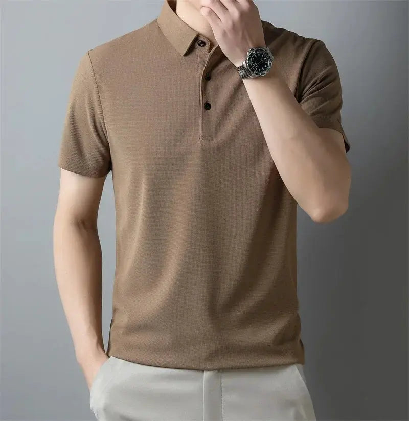 Men's tan polo shirt with classic collar and short sleeves, breathable fabric.