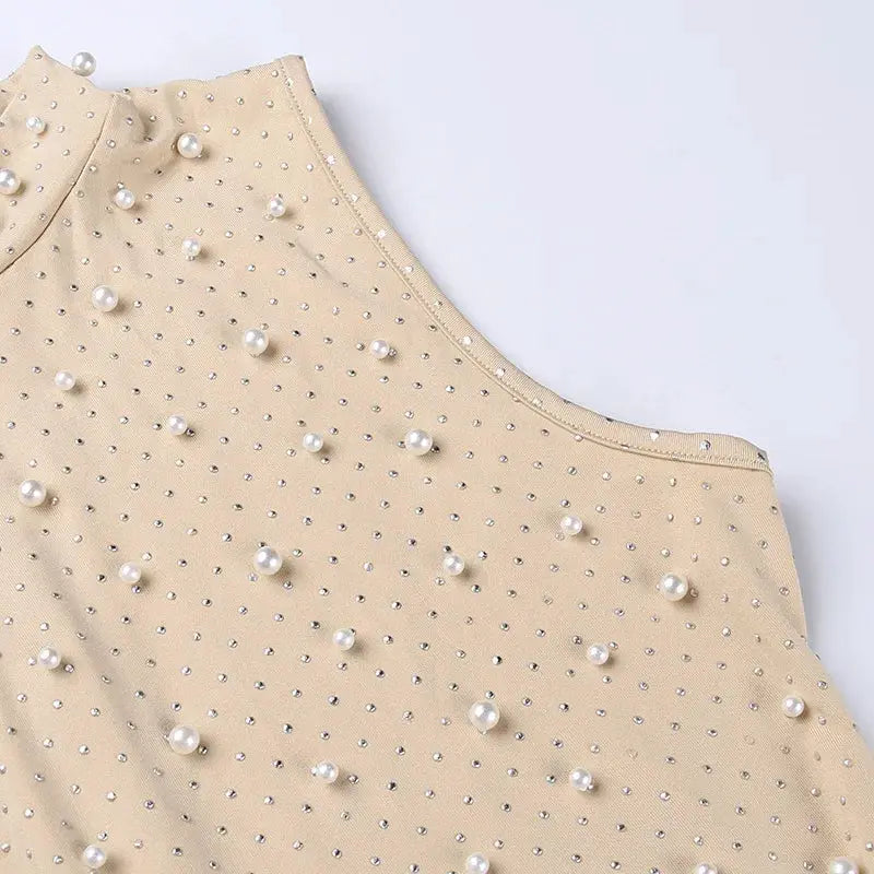 Apricot beaded sleeveless jumpsuit with pearl and crystal embellishments