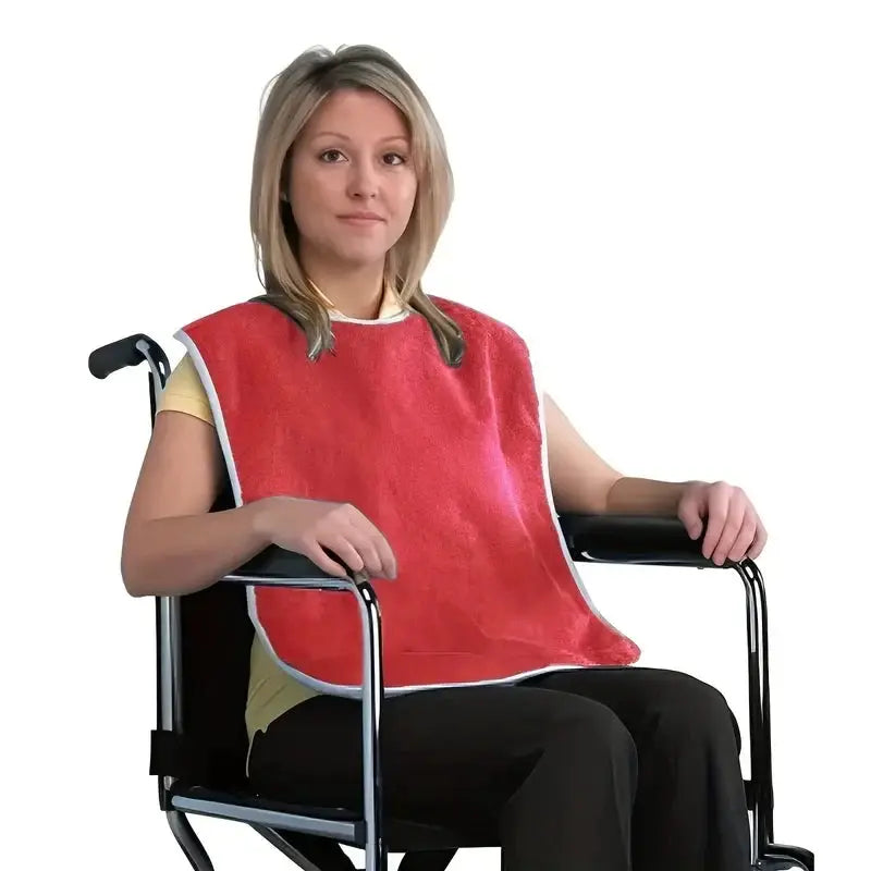 Waterproof adult bib apron in red with white trim for seniors and home use