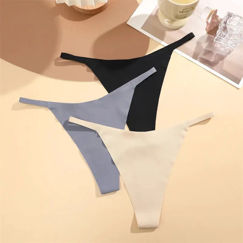 4Pcs set of seamless ultra-thin thong underwear for women in black, gray, light blue, and beige