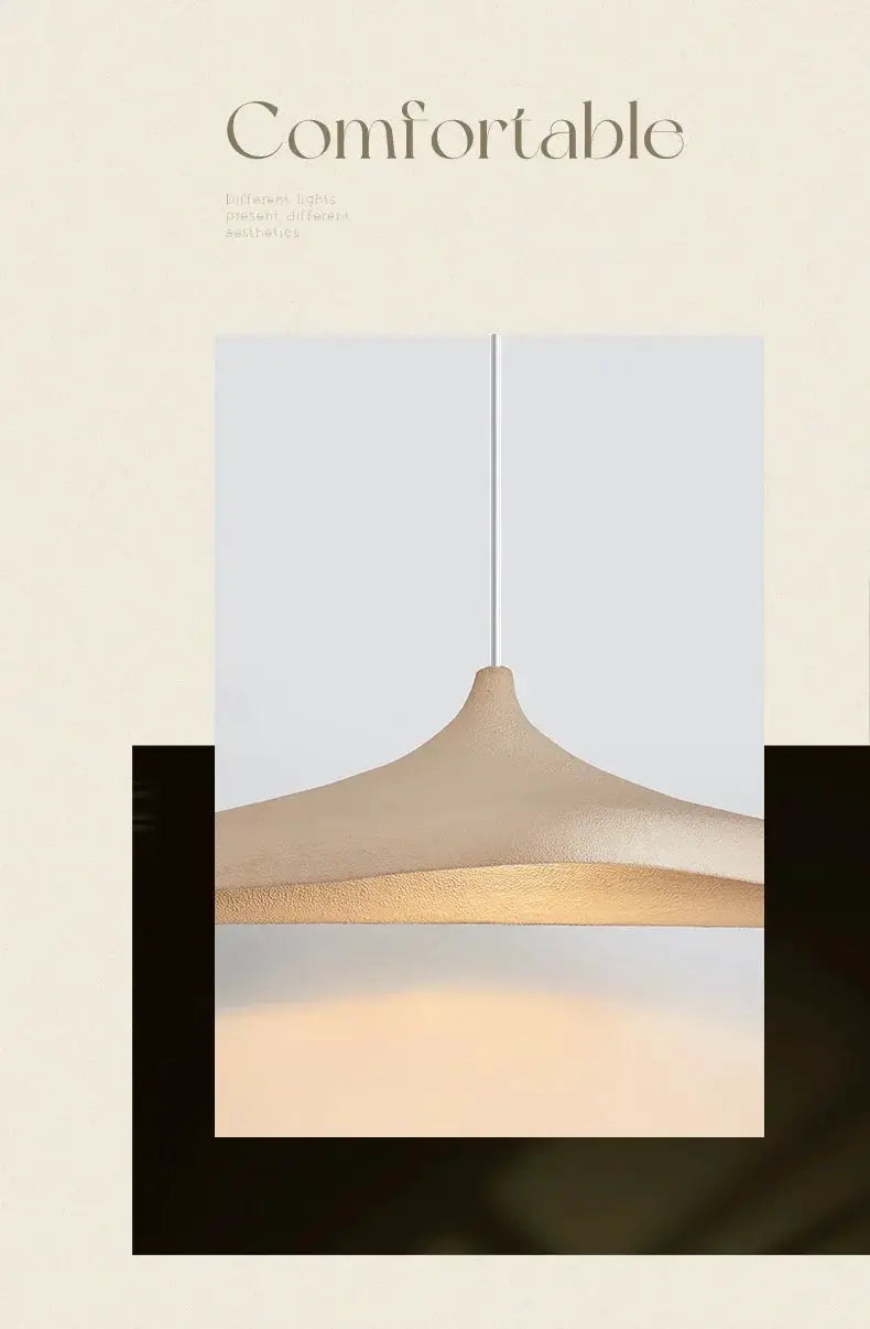 Japanese Wabi Sabi LED pendant lamp with beige curved shade hanging from a cord