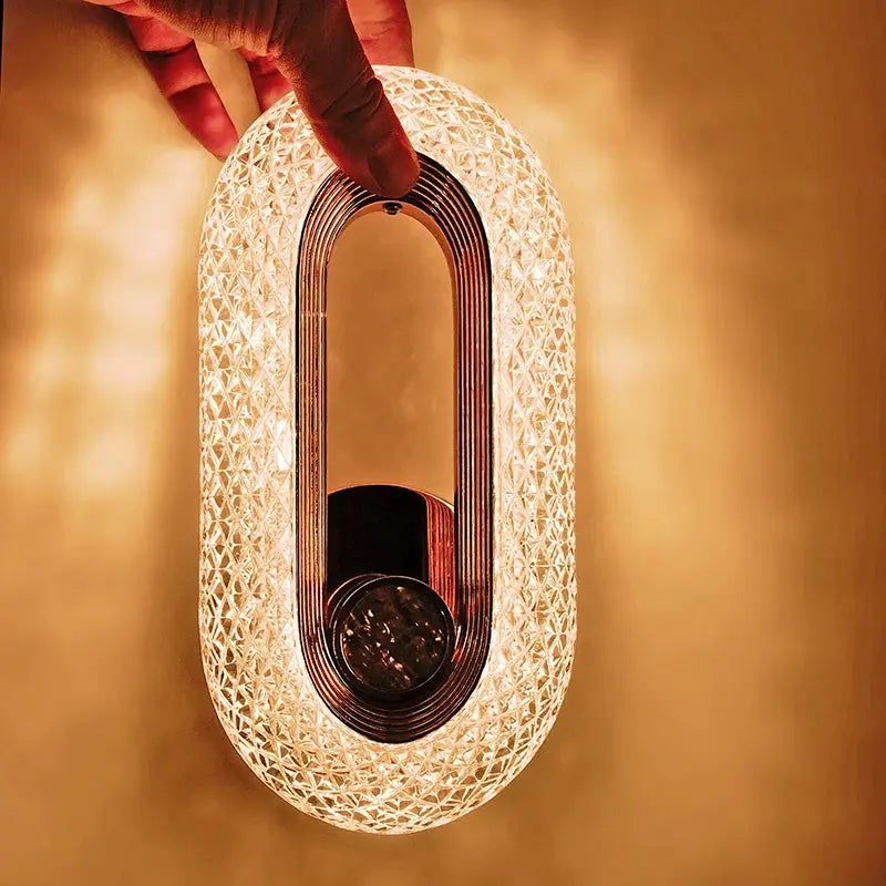 Modern Nordic luxury wall lamp with textured acrylic shade and iron base, warm LED bedroom sconce