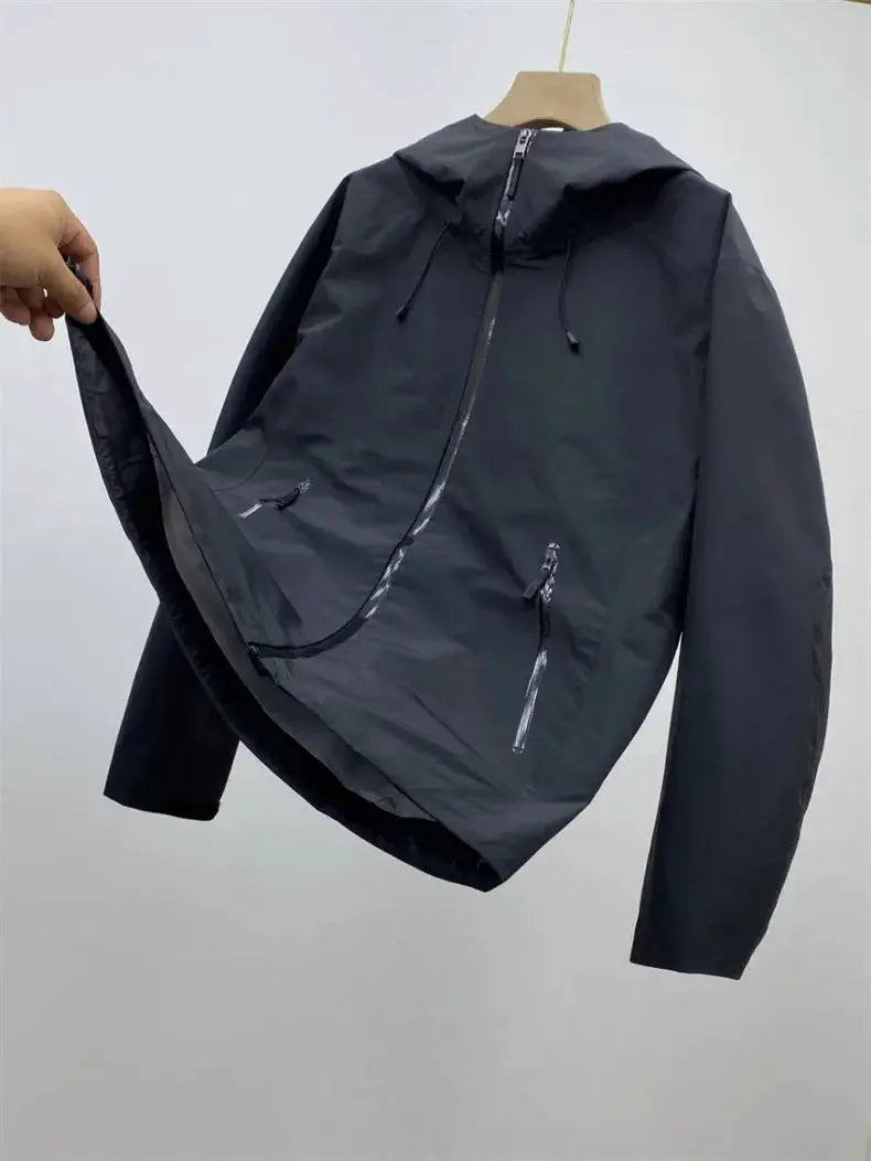 Men's hooded outdoor windproof soft shell jacket in dark gray with zipped pockets, Simples Market.