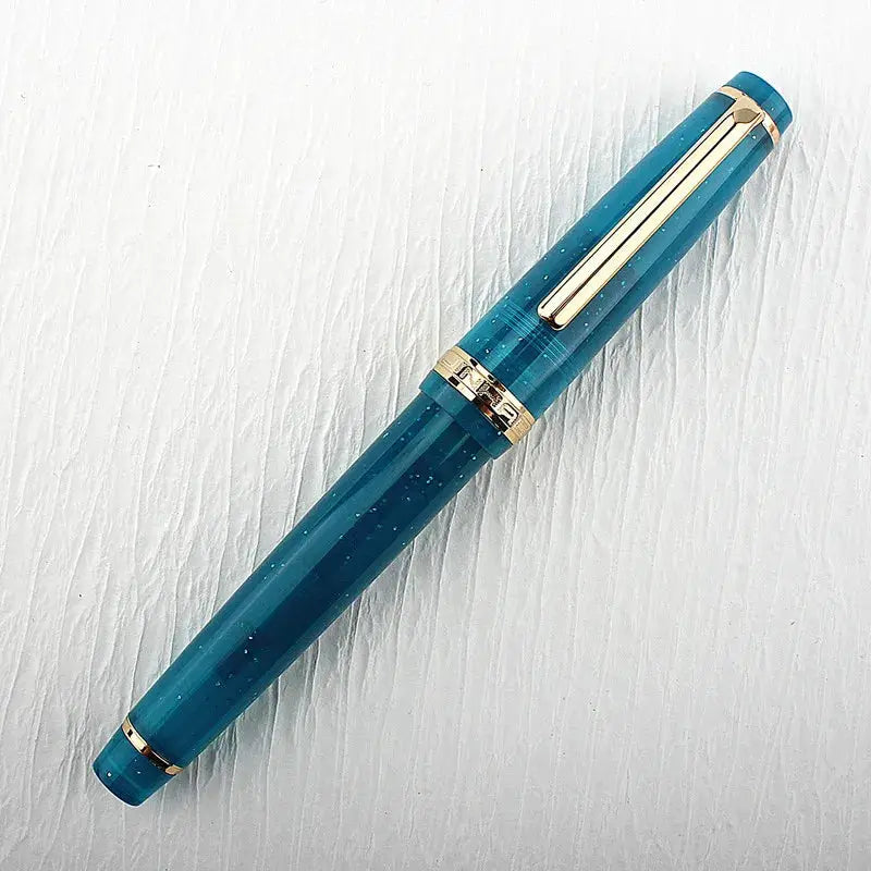 Jinhao 82 fountain pen, teal acrylic with gold trim and clip, converter included