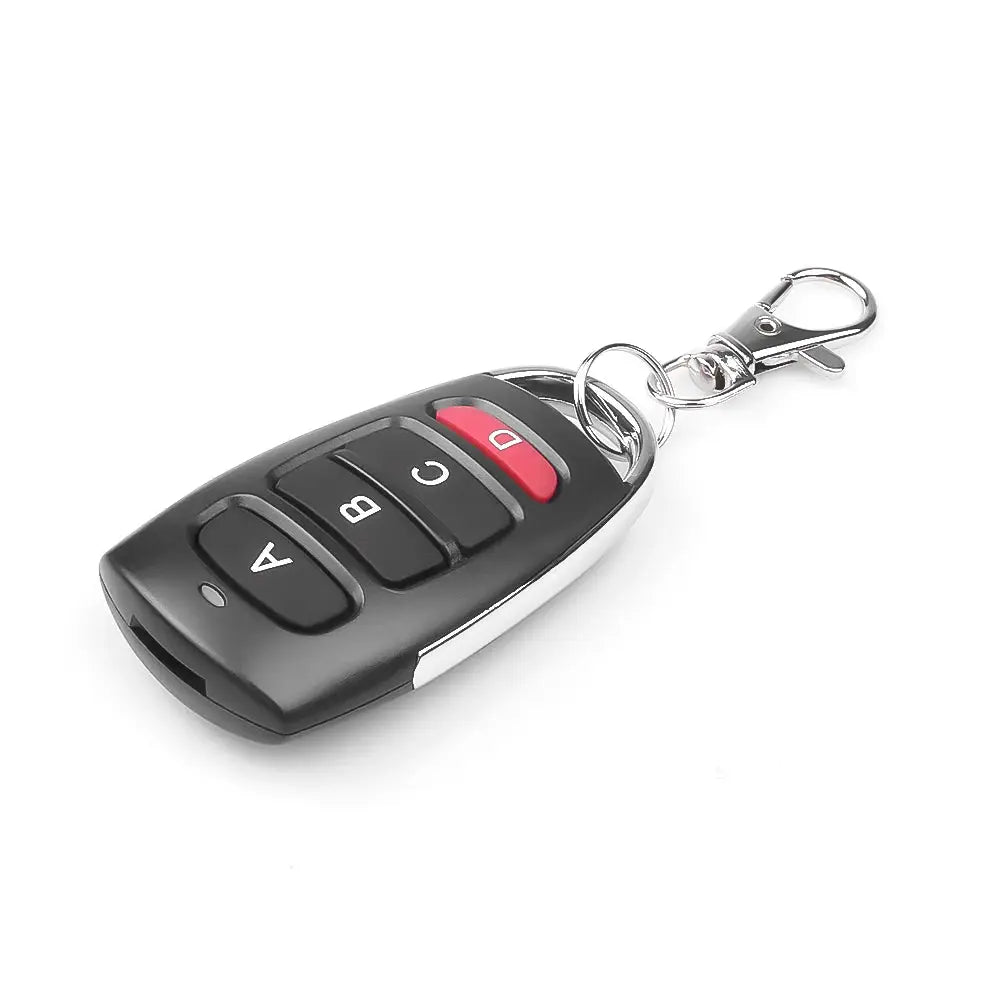 Black 4-button RF 433MHz garage door remote key fob on a metal keychain