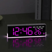 USB powered digital alarm clock by Simples Market with purple LED display and white mood light