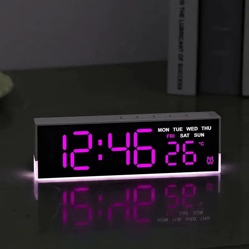 USB powered digital alarm clock by Simples Market with purple LED display and white mood light