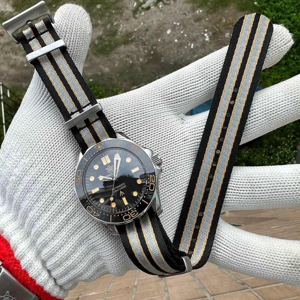 STEELDIVE SD1957 42mm dive watch with ceramic bezel on striped NATO strap