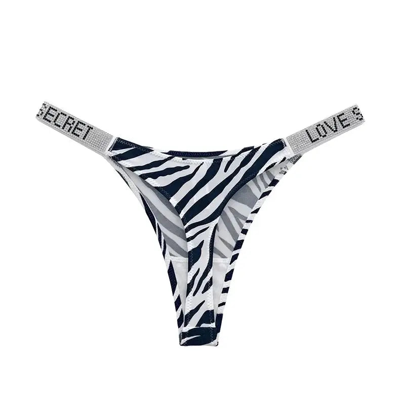 Low waist zebra print thong with rhinestone embellished straps