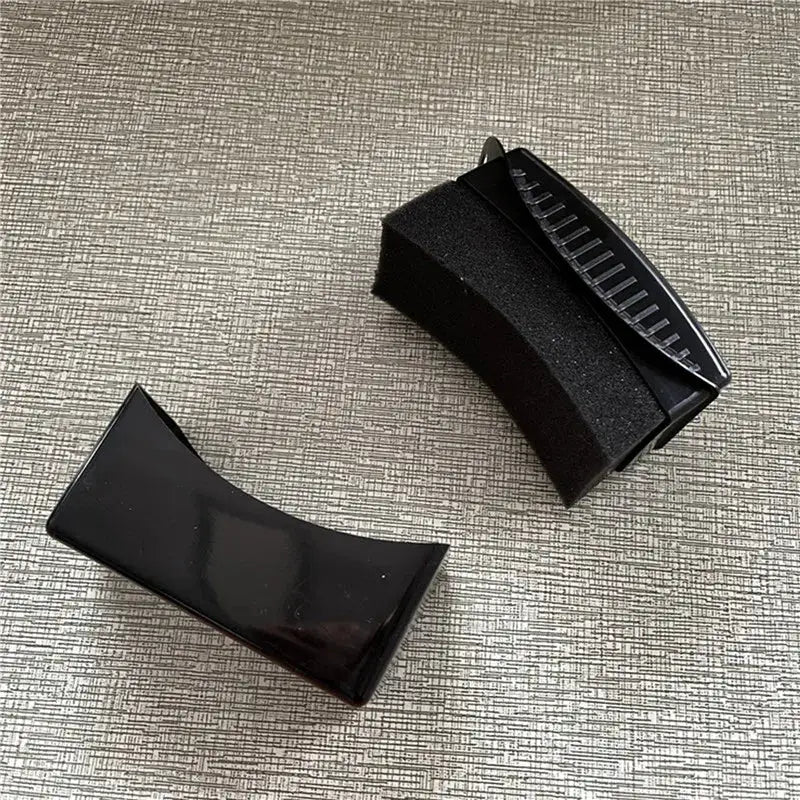 Car wheel detailing kit by Simples Market; black ABS plastic contoured applicator with foam sponge pad (2 pieces).