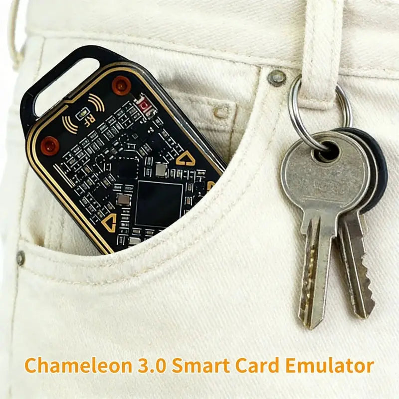Chameleon 3.0 smart card emulator, black circuit-board module in a jeans pocket beside keys