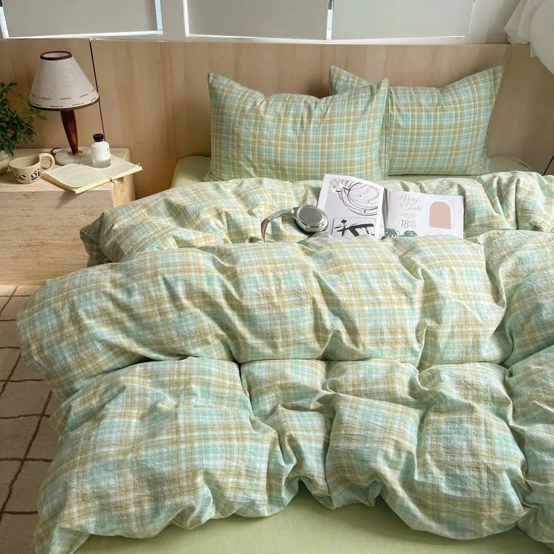 100% cotton striped duvet cover set with pillowcases by Simples Market in mint green and pale yellow