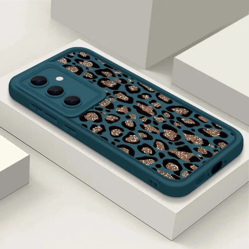 Phone case in brown leopard print with teal TPU bumper for Samsung Galaxy A-series and S-series phones.