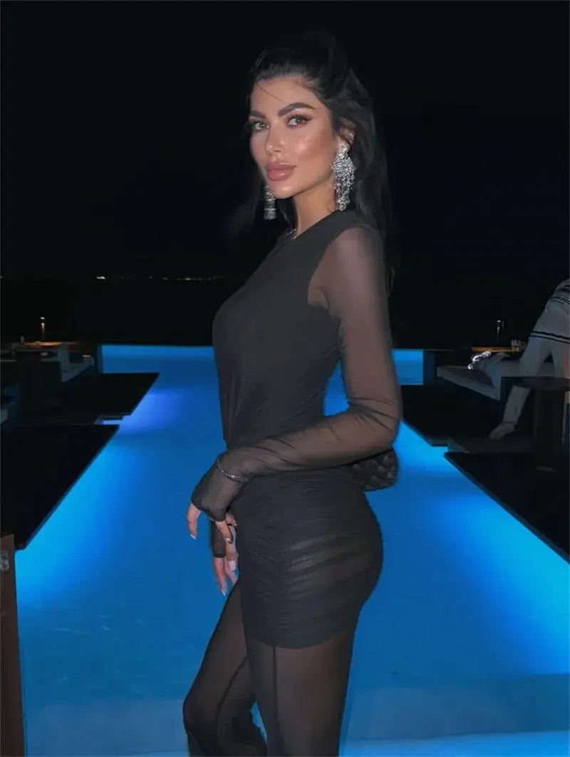 Mozision black deep-V mesh long-sleeve ruched jumpsuit by Simples Market for club party wear