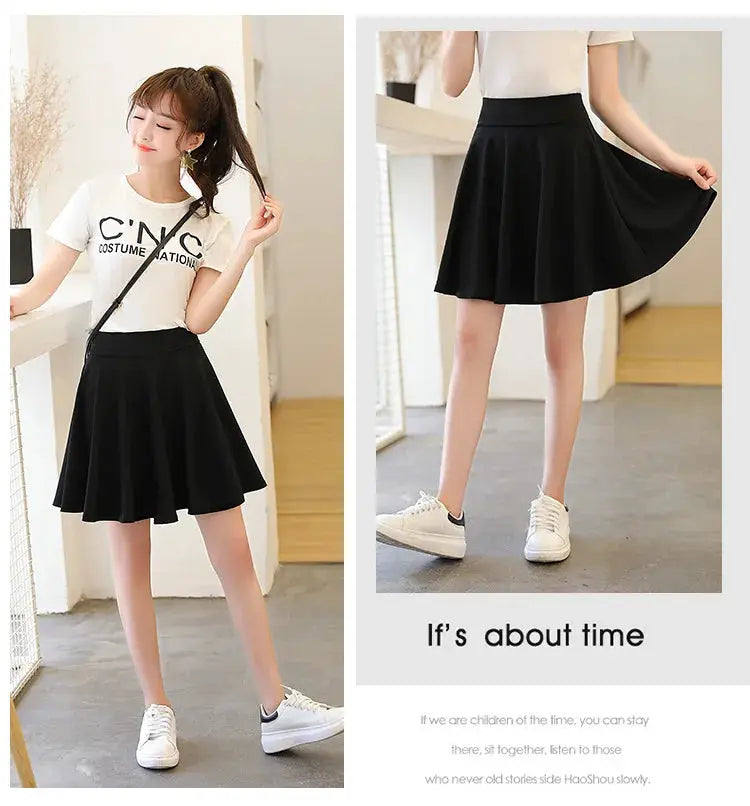 Black flared skater skirt worn with a white top and white sneakers; front and side views