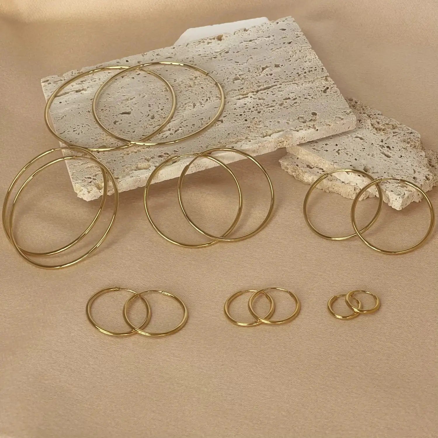Stainless steel gold-tone circle hoop earrings set for women, multiple sizes 12–70mm