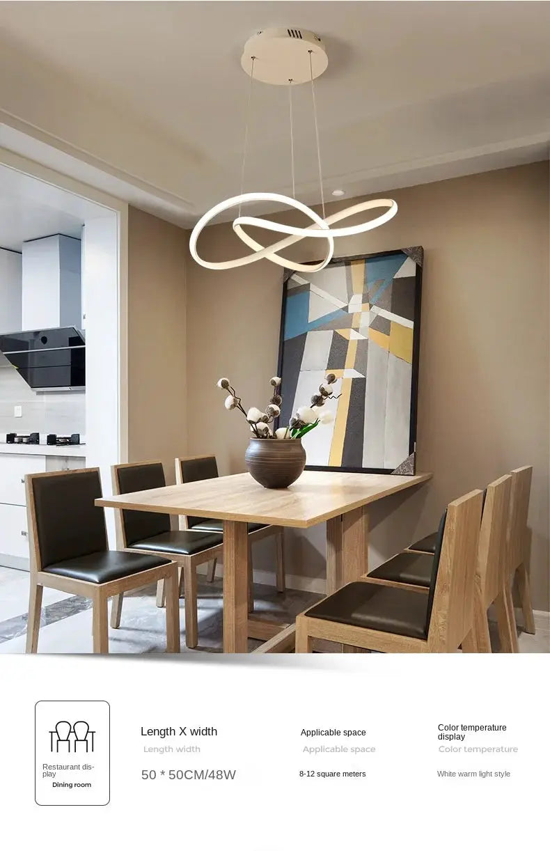 Dining room pendant lamp with two intertwined white circular LED rings, Nordic modern style over a wooden dining table